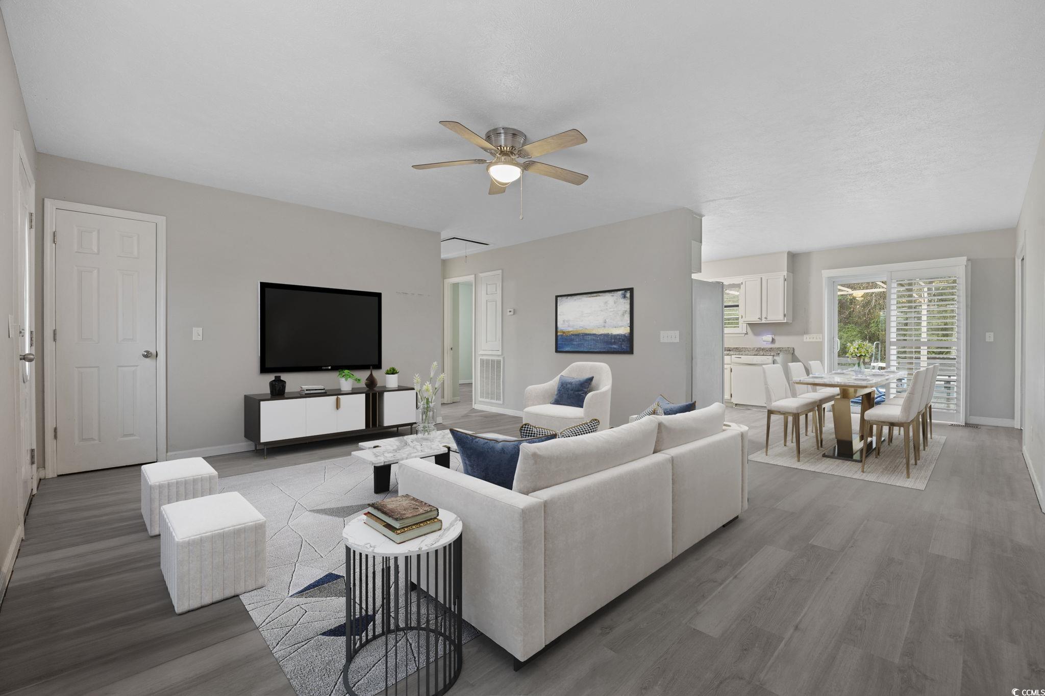 5180 Graham Street Loris, SC 29569 - Photo 4 of 28 Living area featuring light wood-type flooring and a ceiling fan
