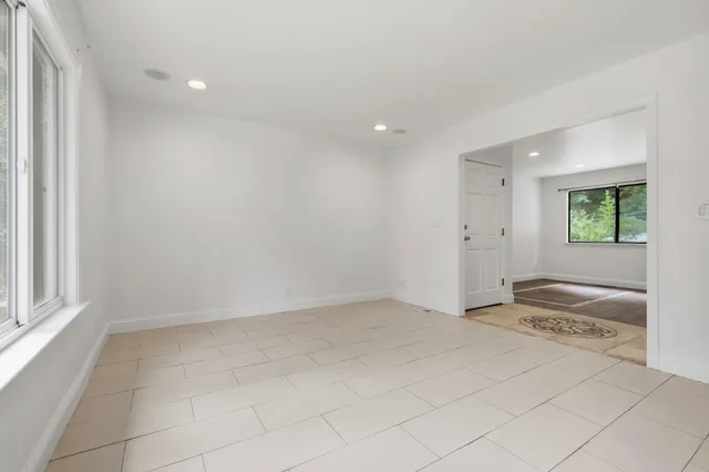 a view of an empty room and window