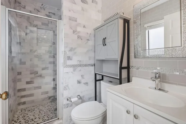 a view of backyard with deck and wooden floor