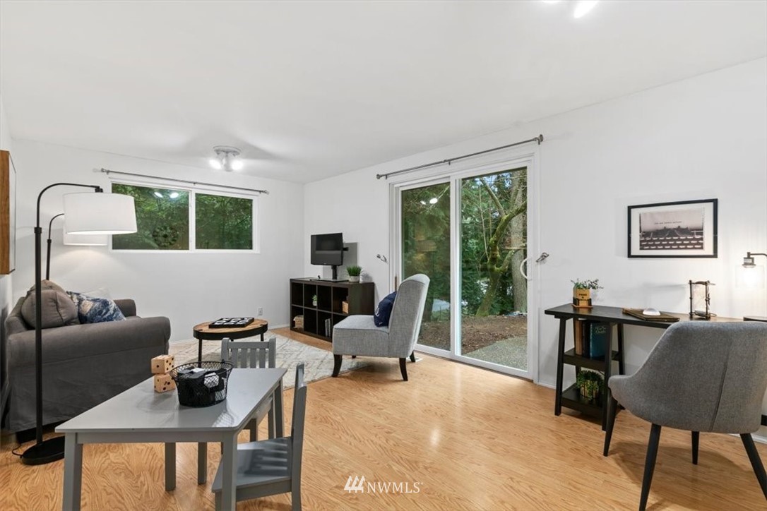 5624 227th Street Southeast Bothell, WA 98021 - Photo 14 of 24 a work room with furniture and large windows