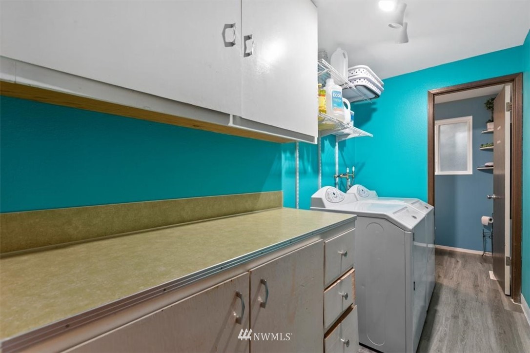 5624 227th Street Southeast Bothell, WA 98021 - Photo 15 of 24 a room with a cabinets and a swimming pool