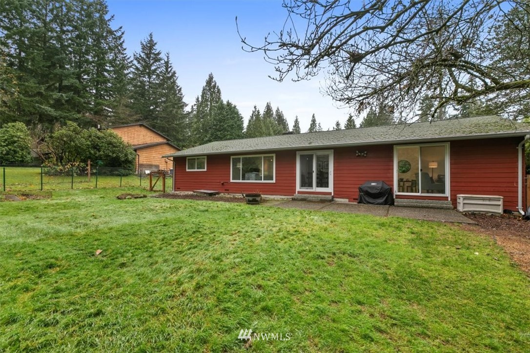5624 227th Street Southeast Bothell, WA 98021 - Photo 23 of 24 a view of a house with a backyard