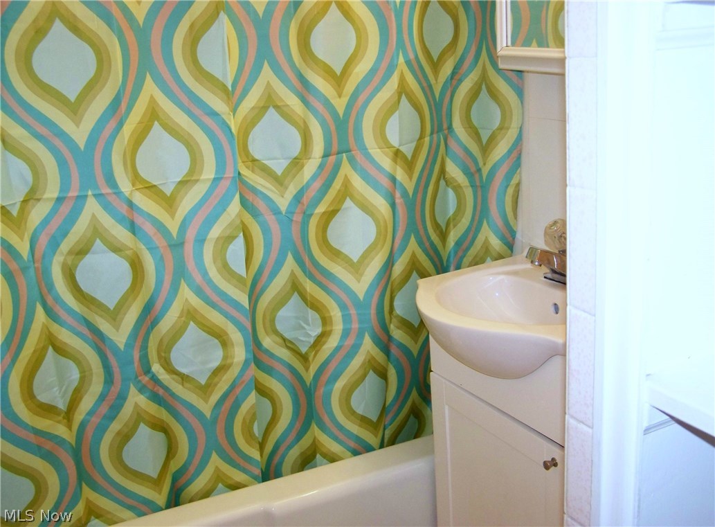 10801 Granger Road Cleveland, OH 44125 - Photo 6 of 9 Updated full bath on main floor