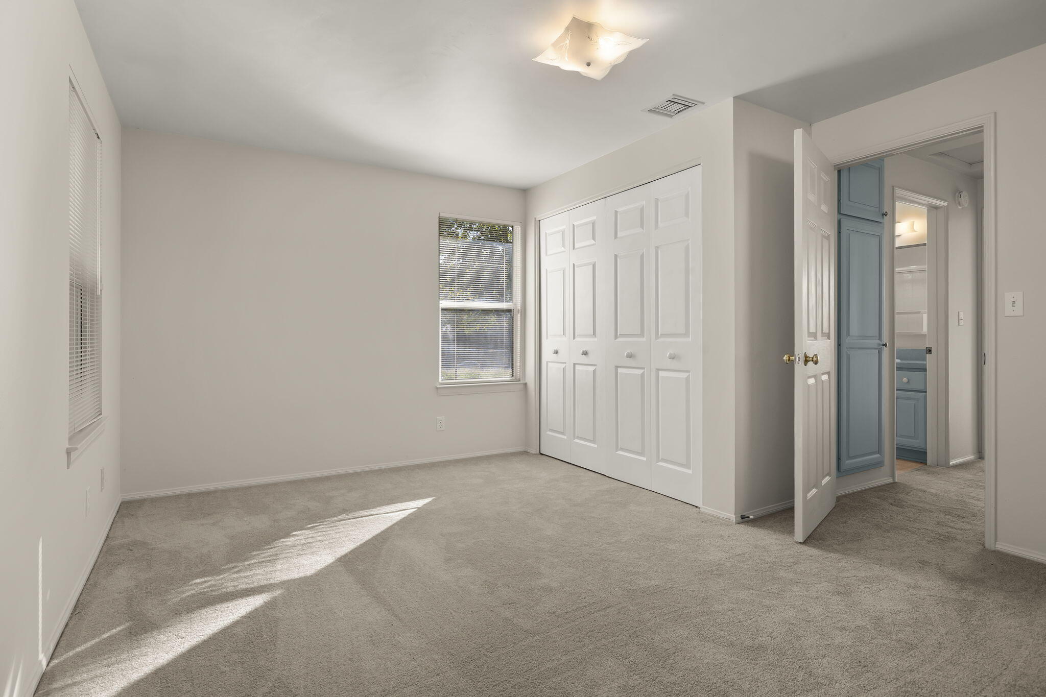 248 Old Grade Road Oak View, CA 93022 - Photo 12 of 41 an empty room with windows and closet