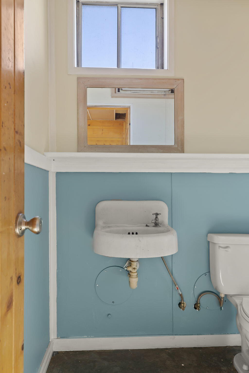 248 Old Grade Road Oak View, CA 93022 - Photo 34 of 41 a bathroom with a sink a toilet and mirror