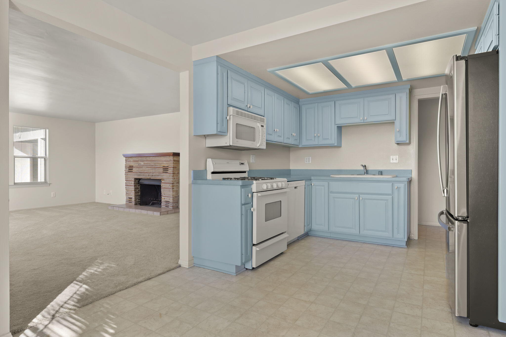248 Old Grade Road Oak View, CA 93022 - Photo 9 of 41 a kitchen with stainless steel appliances granite countertop a stove a sink and a refrigerator