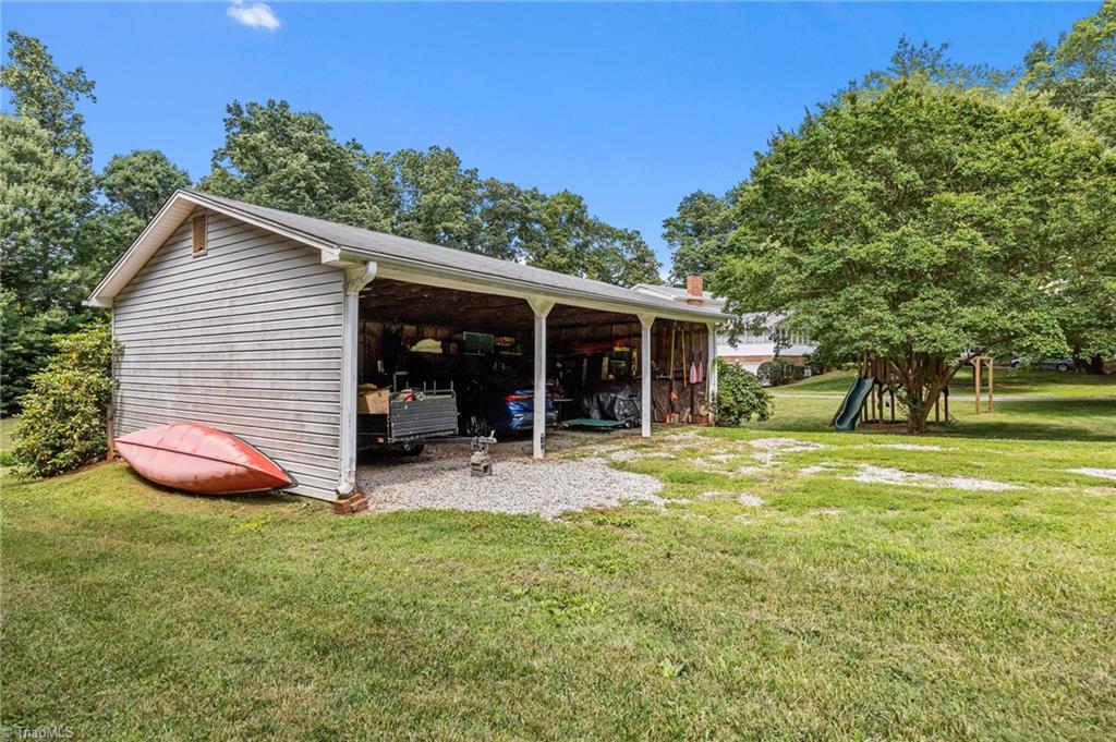 3601 Edgefield Road Greensboro, NC 27409 - Photo 3 of 45 3-car carport