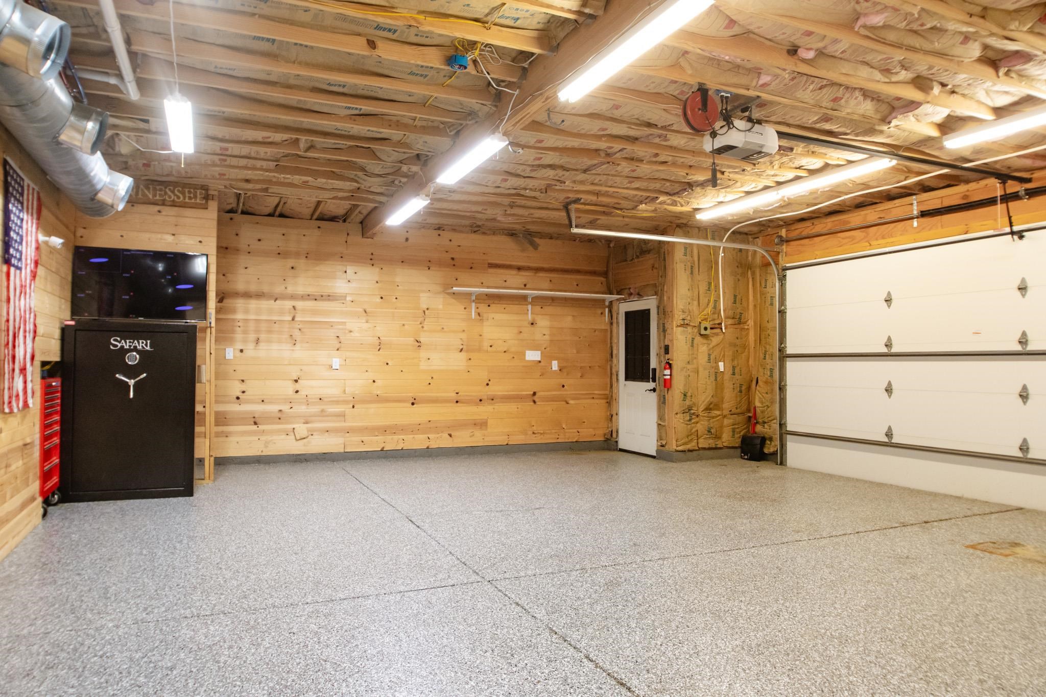5309 Evergreen Road Lakeland, TN 38002 - Photo 31 of 40 Garage with a garage door opener