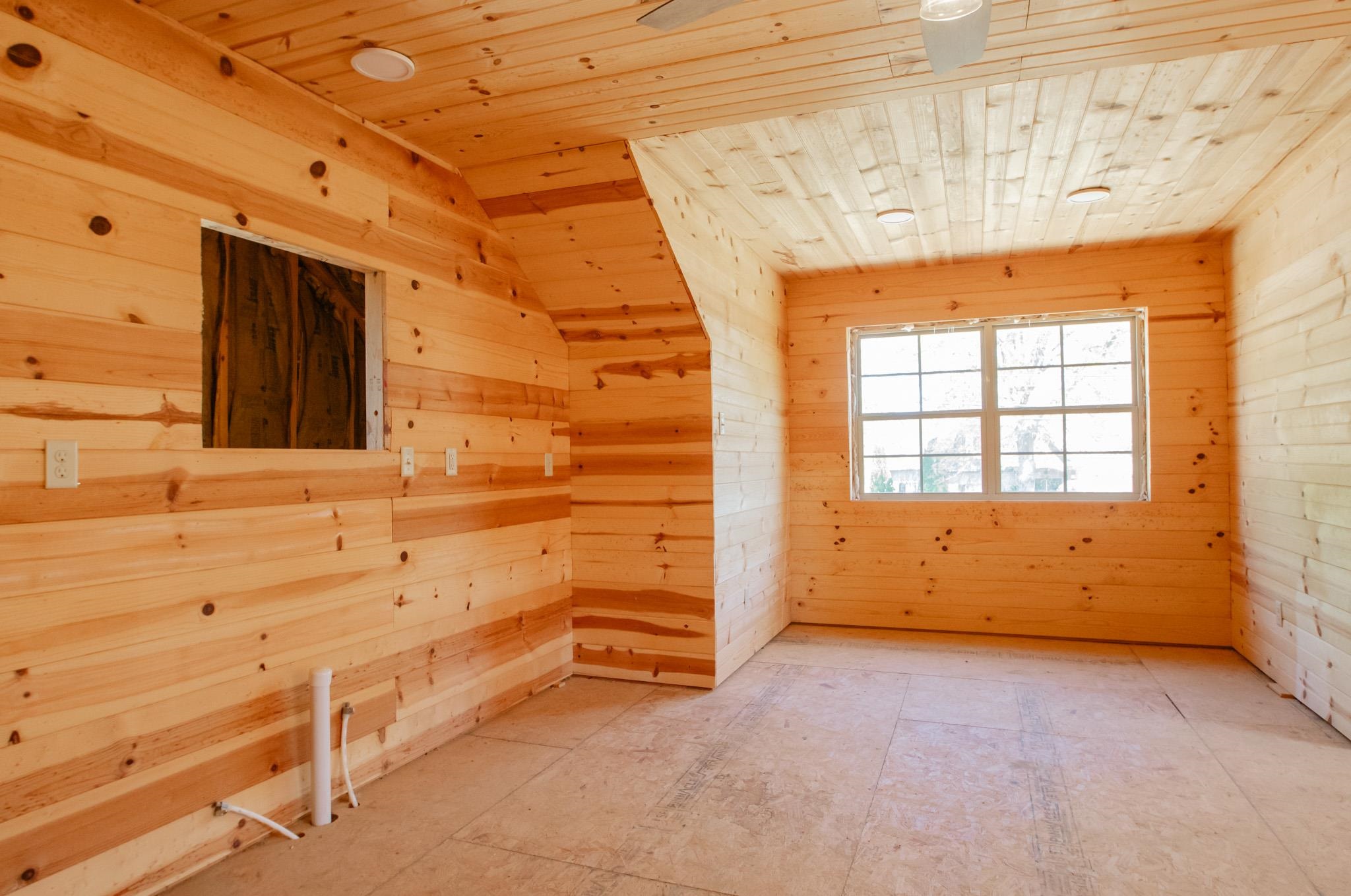 5309 Evergreen Road Lakeland, TN 38002 - Photo 36 of 40 Spare room with wood walls, a sauna, vaulted ceiling, and wooden ceiling