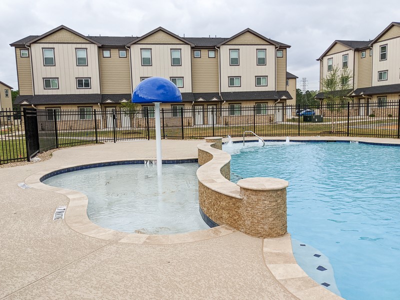 12603 Telge Road, Unit 4B Cypress, TX 77429 - Photo 13 of 16 a view of a house with swimming pool and sitting area