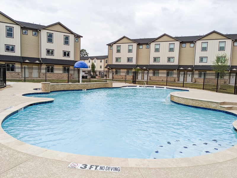 12603 Telge Road, Unit 4B Cypress, TX 77429 - Photo 14 of 16 a view of a living room and kitchen