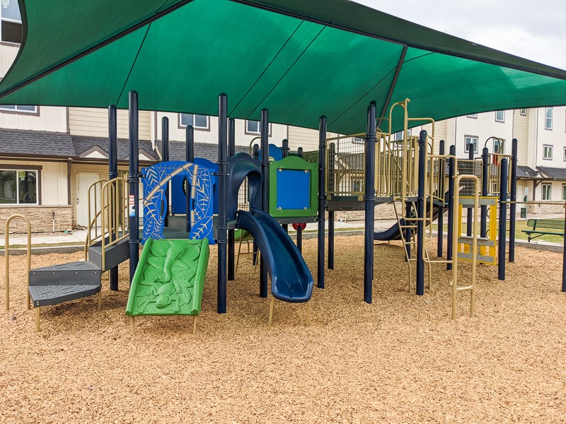 12603 Telge Road, Unit 4B Cypress, TX 77429 - Photo 15 of 16 an outdoor space with furniture and umbrella