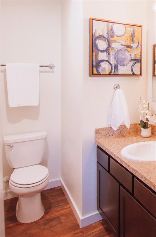 12603 Telge Road, Unit 4B Cypress, TX 77429 - Photo 7 of 16 a bathroom with a toilet and a sink