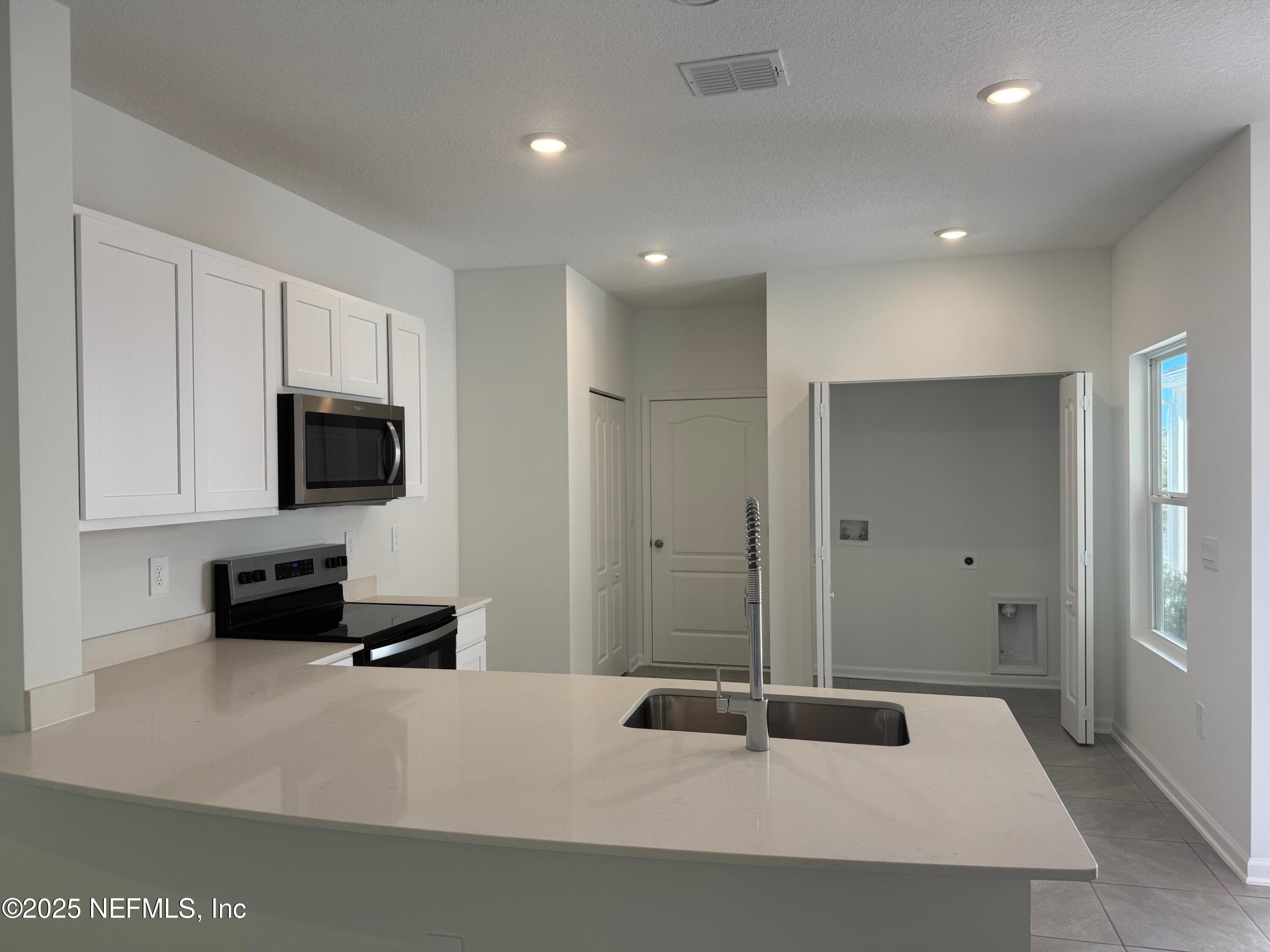 63 Blue Hvn Road St. Augustine, FL 32095 - Photo 6 of 59 kitchen 2