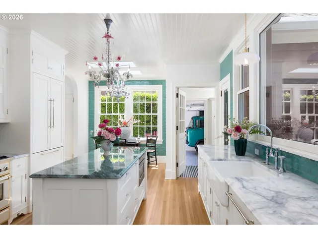 a view of living room and kitchen