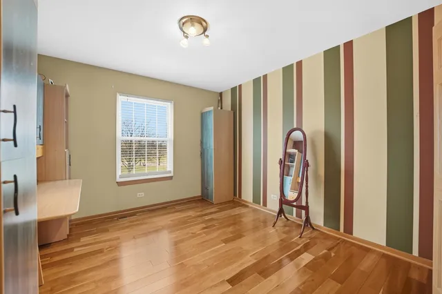 a view of a room with a large window