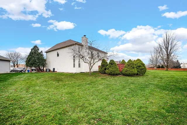 a view of a backyard with garden