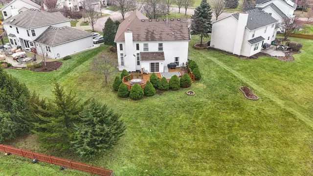 an aerial view of a house with garden
