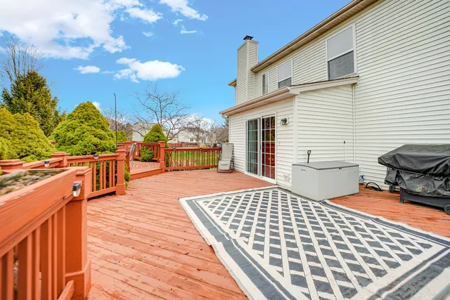 a view of a balcony with chairs