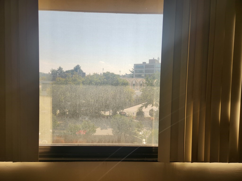 70 Southbridge Street, Unit 302 Worcester, MA 01608 - Photo 13 of 22 a view of a glass door and a window
