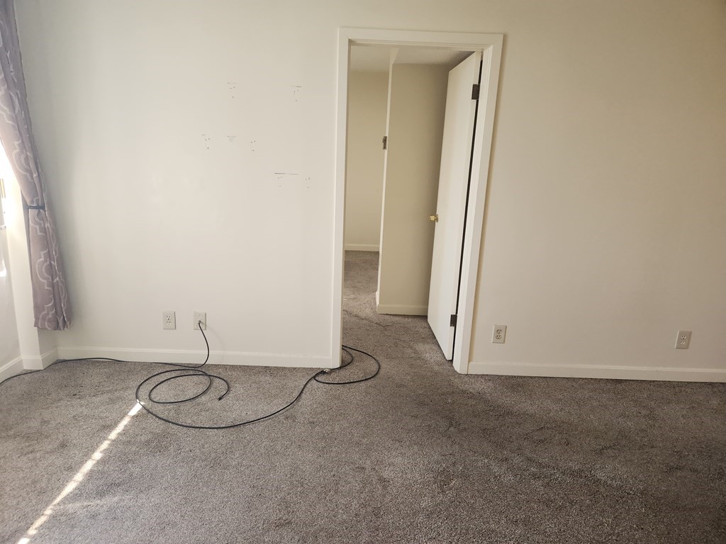 70 Southbridge Street, Unit 302 Worcester, MA 01608 - Photo 14 of 22 a view of a room with rack on the wall