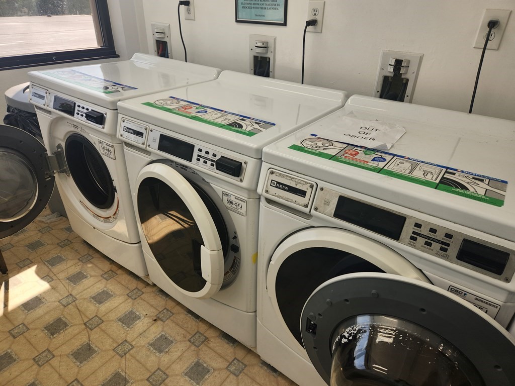 70 Southbridge Street, Unit 302 Worcester, MA 01608 - Photo 8 of 22 a utility room with dryer and washer