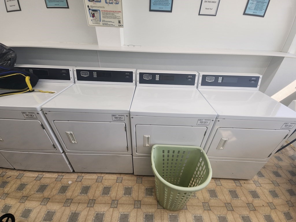 70 Southbridge Street, Unit 302 Worcester, MA 01608 - Photo 9 of 22 a utility room with a washer and dryer