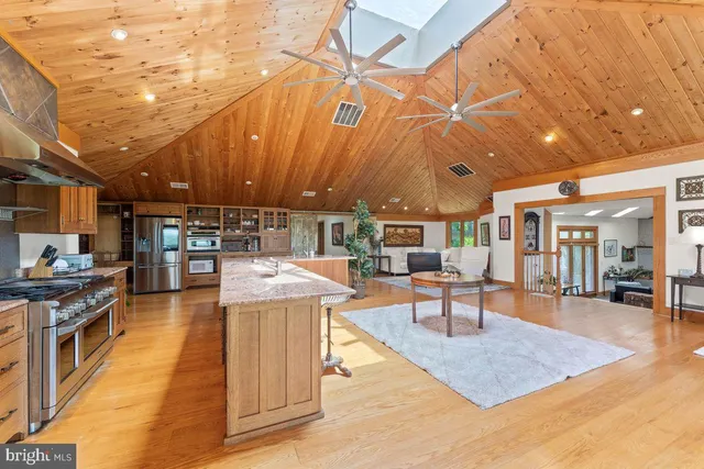 a kitchen with a table and chairs in it