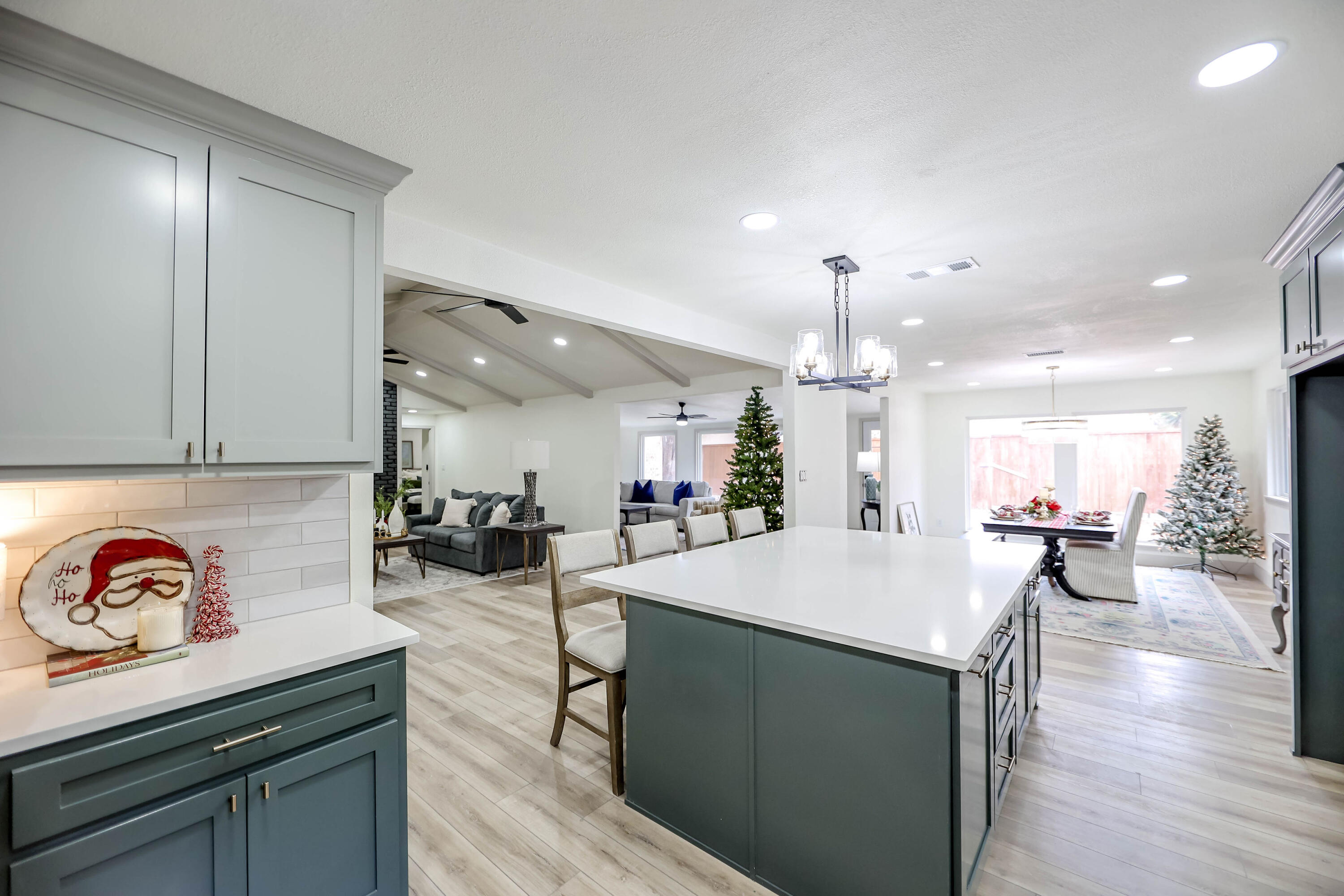 4411 79th Street Lubbock, TX 79424 - Photo 12 of 42 a large kitchen with a table and chairs