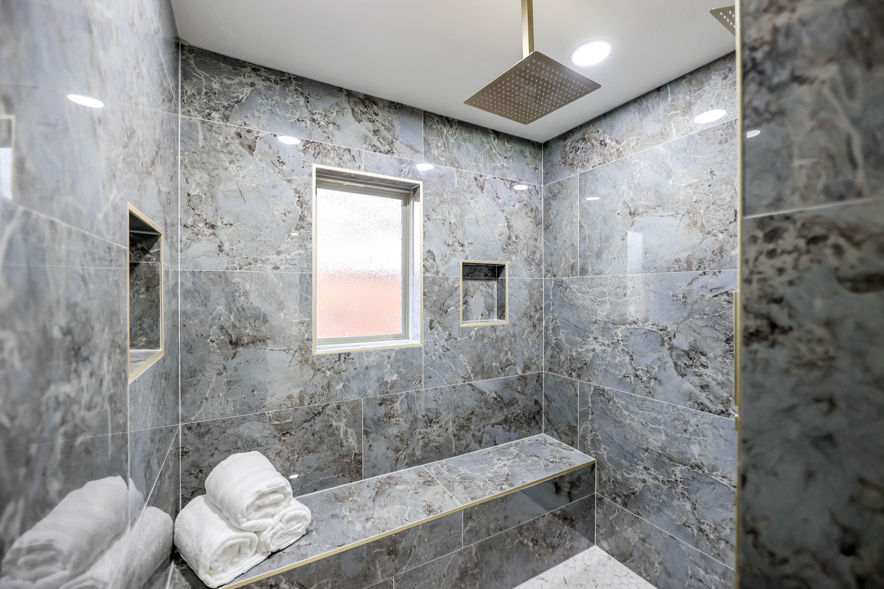 4411 79th Street Lubbock, TX 79424 - Photo 33 of 42 a bathroom with a granite countertop shower a toilet and a sink