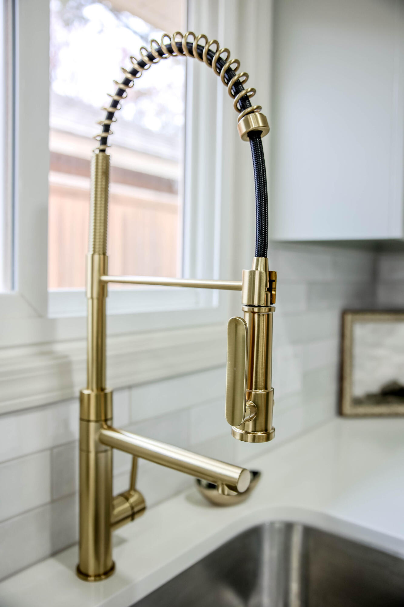4411 79th Street Lubbock, TX 79424 - Photo 38 of 42 a bathroom with a sink and a mirror