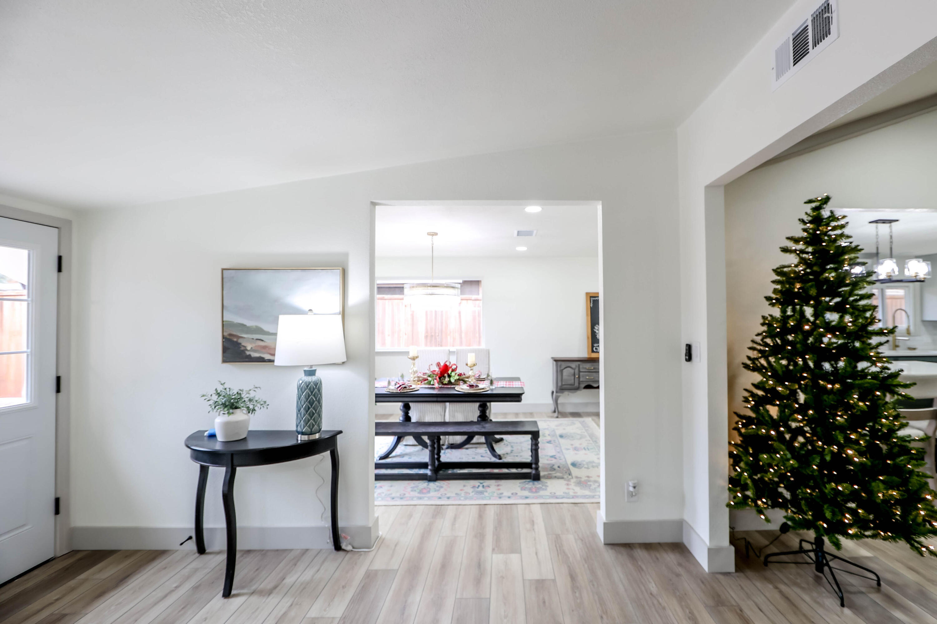 4411 79th Street Lubbock, TX 79424 - Photo 9 of 42 a living room with furniture and a potted plant