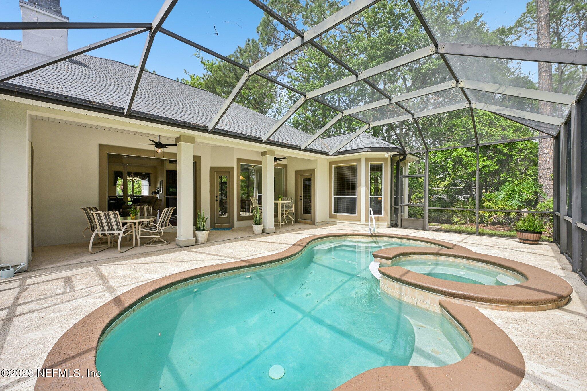 1801 Wards Landing Court Fleming Island, FL 32003 - Photo 5 of 60 Pool and patio view