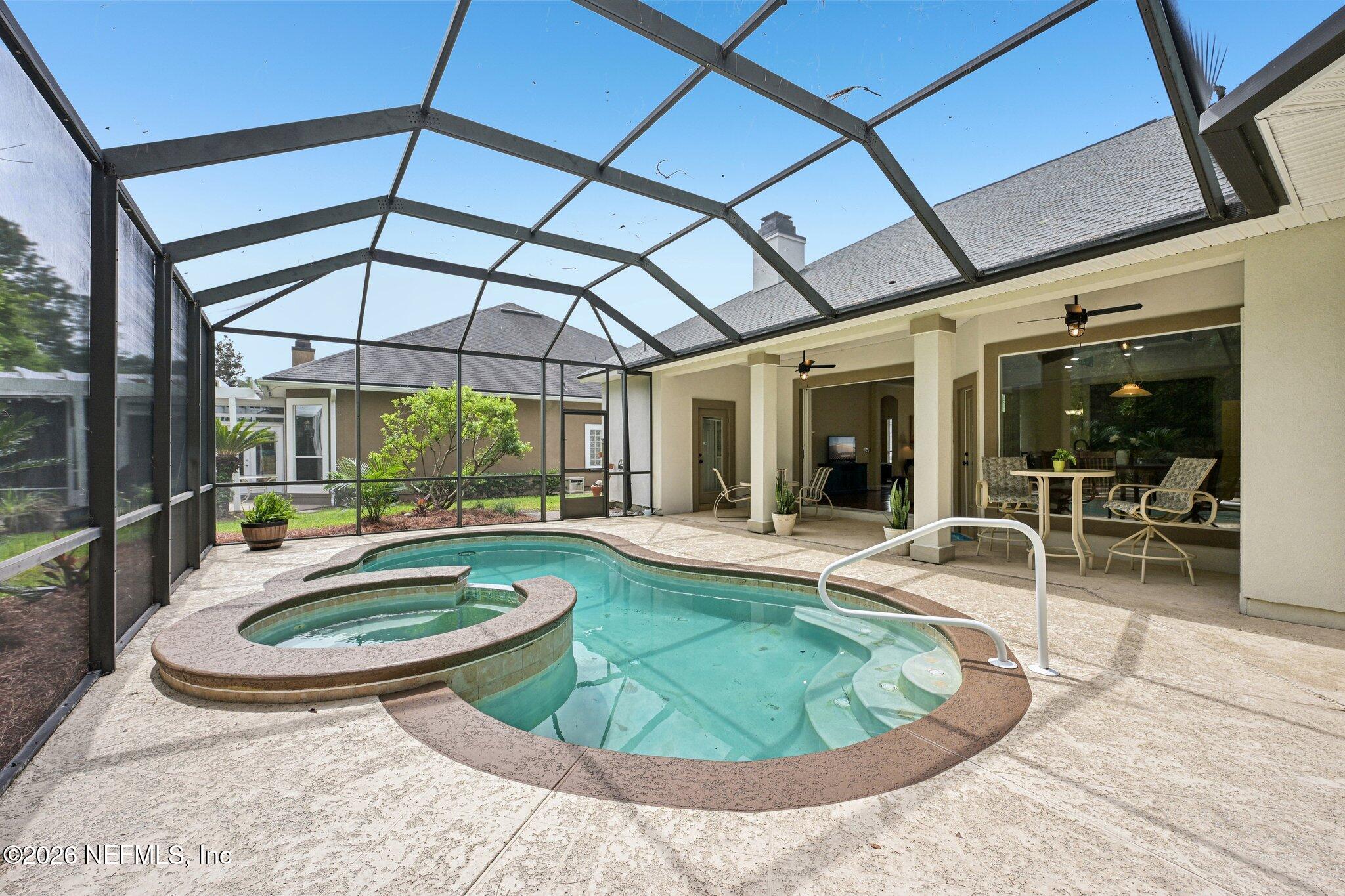 1801 Wards Landing Court Fleming Island, FL 32003 - Photo 7 of 60 Pool and patio view