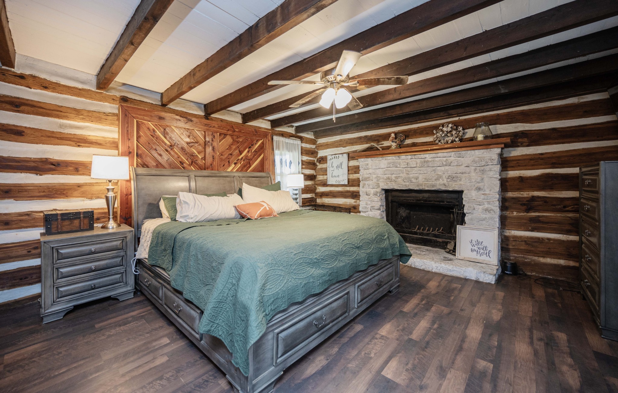 9202 Link Road Christiana, TN 37037 - Photo 16 of 37 a bedroom with a bed and a fireplace