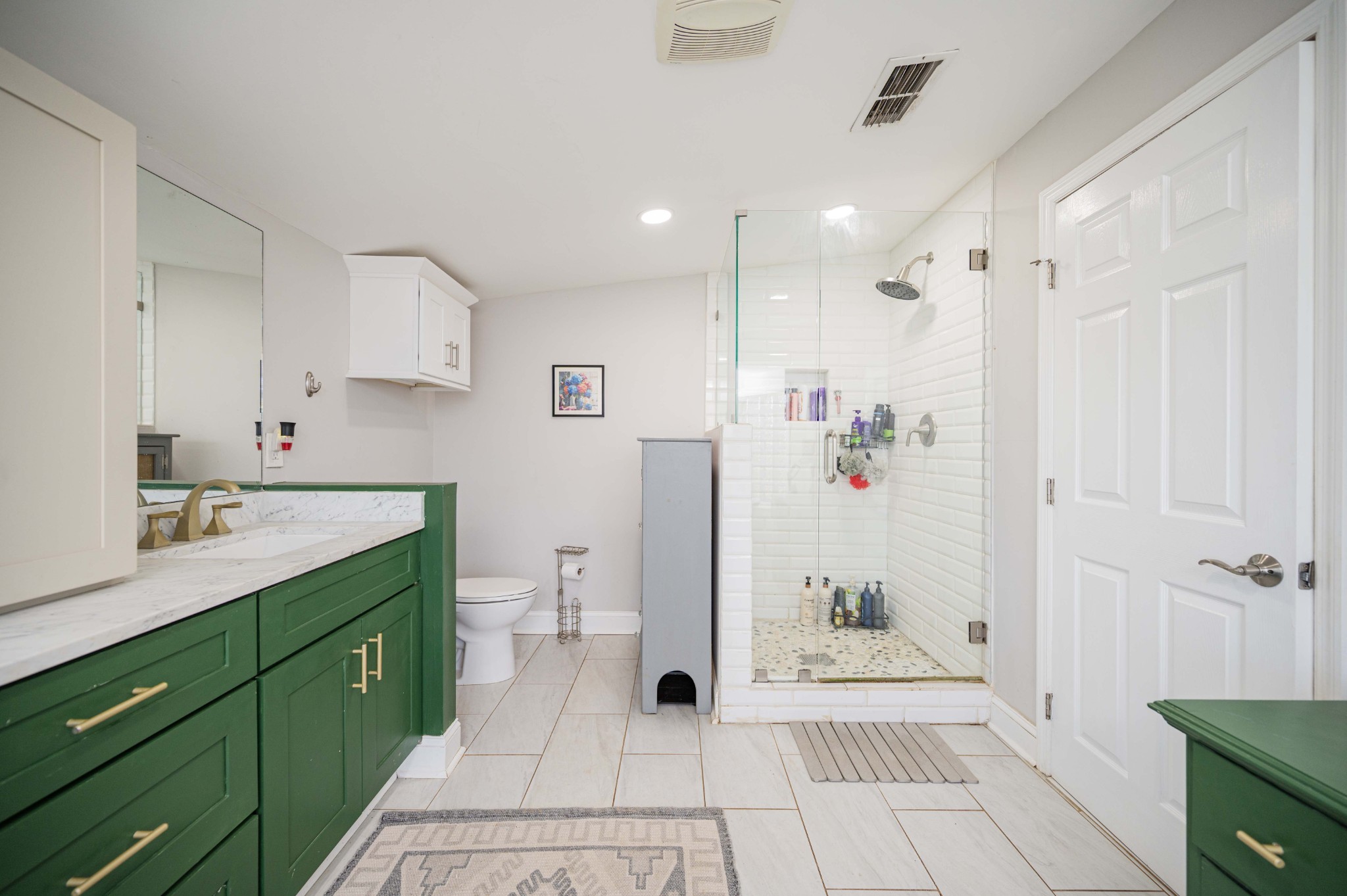 9202 Link Road Christiana, TN 37037 - Photo 21 of 37 a spacious bathroom with a double vanity sink toilet and shower