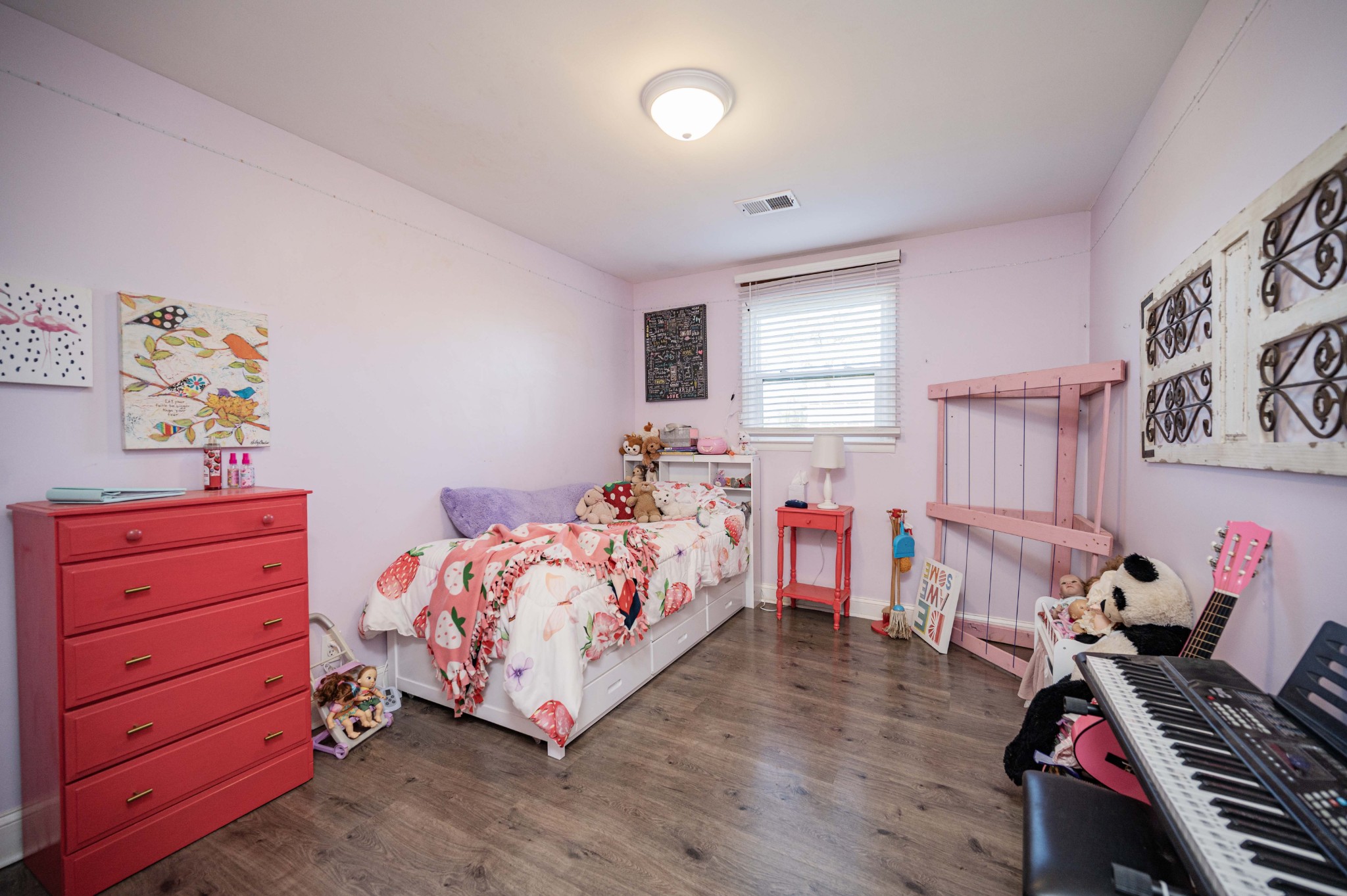 9202 Link Road Christiana, TN 37037 - Photo 25 of 37 a bedroom with a bed and wooden floor