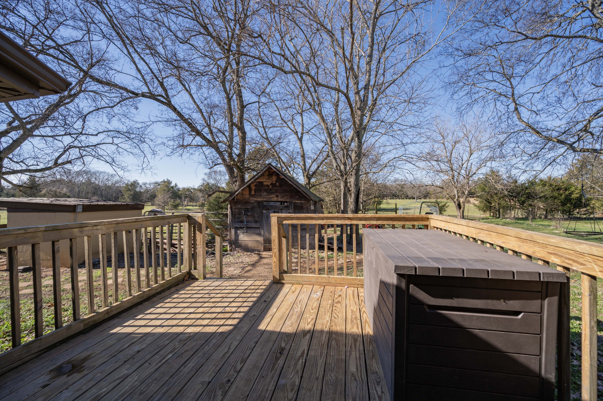 9202 Link Road Christiana, TN 37037 - Photo 29 of 37 a view of house with wooden deck and trees