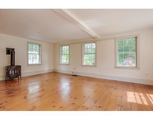 62 Still River Road Harvard, MA 01451 - Photo 8 of 20 a view of an empty room with a window