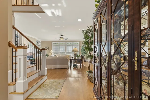 a lobby with furniture and staircase