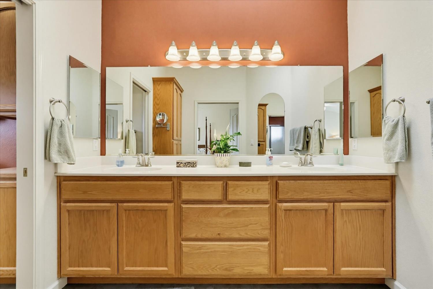 970 Morgan Ranch Drive Grass Valley, CA 95945 - Photo 24 of 76 a bathroom with a double vanity sink and a mirror