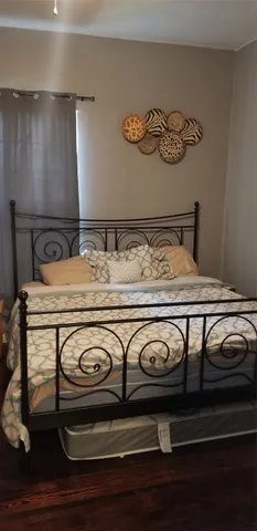 a utility room with a sink and a stove top oven