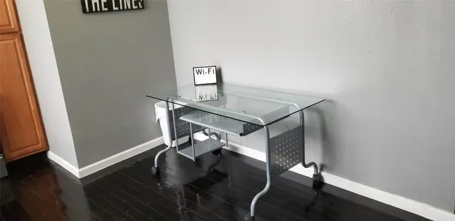 a view of entryway with wooden floor