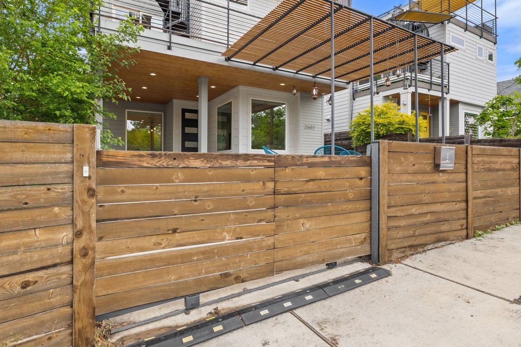 2602 East 13th Street Austin, TX 78702 - Photo 2 of 27 Security gate at the entrance of the property