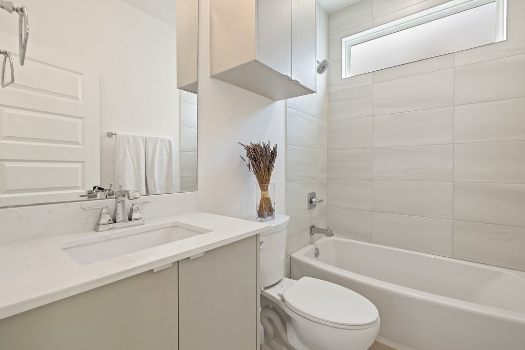 2602 East 13th Street Austin, TX 78702 - Photo 19 of 27 Full guest bath upstairs - ideal for guests with easy access to the bedrooms.