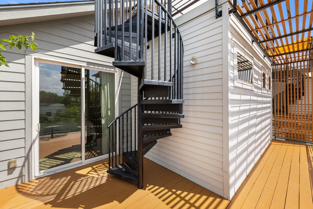 2602 East 13th Street Austin, TX 78702 - Photo 21 of 27 A private staircase takes you to the "crows' nest". The top deck with downtown and Capital views!