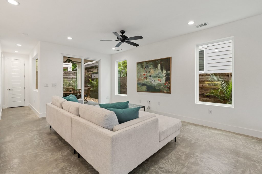 2602 East 13th Street Austin, TX 78702 - Photo 5 of 27 Low maintenance, polished concrete floors compliment the light and bright paint scheme.