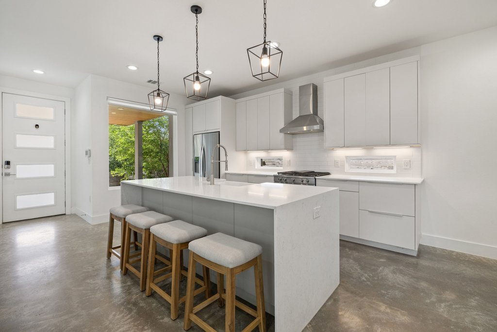 2602 East 13th Street Austin, TX 78702 - Photo 6 of 27 The cook can work their magic in the kitchen while visiting with guests.