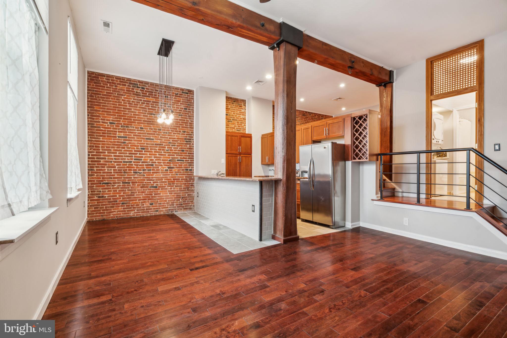 12 Letitia Street, Unit 201 Philadelphia, PA 19106 - Photo 12 of 30 an empty room with wooden floor and windows