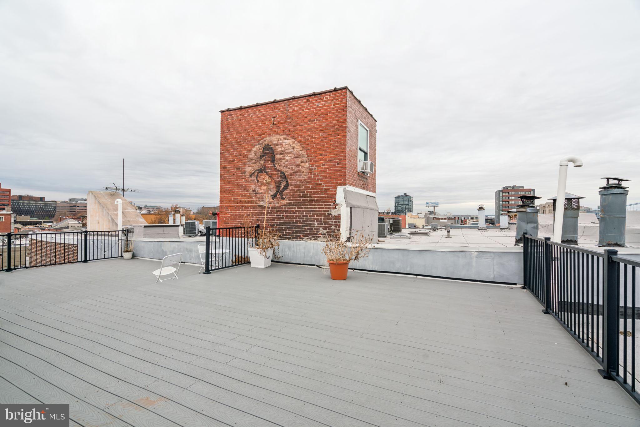 12 Letitia Street, Unit 201 Philadelphia, PA 19106 - Photo 23 of 30 a view of roof deck with table and chairs